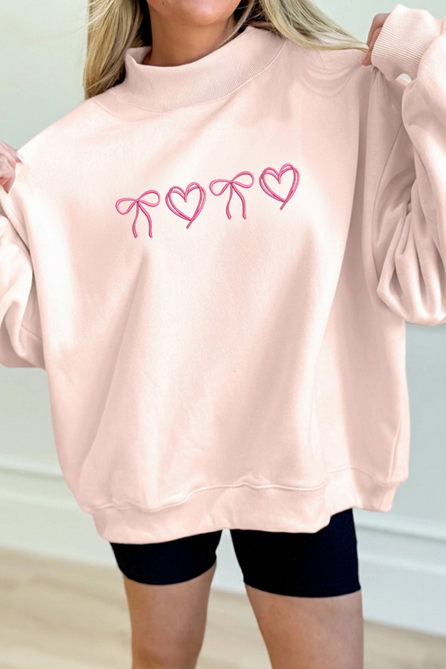 Sweat femme brodé, col montant — abricot