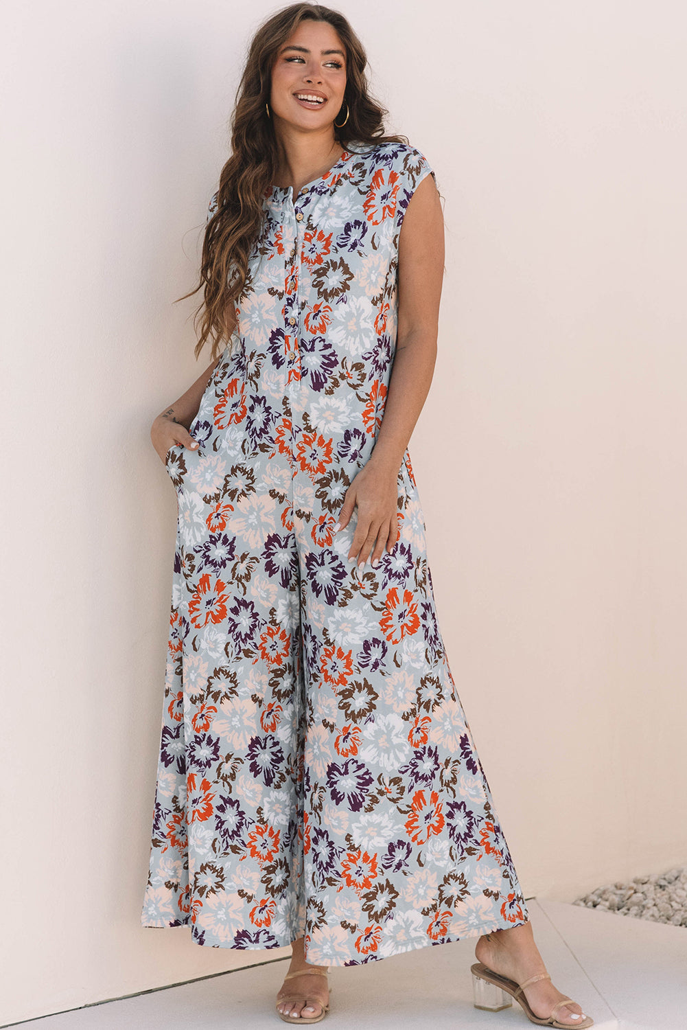 Combinaison femme floral, boutonnée, poches, sans manches, jambe large — bleu ciel